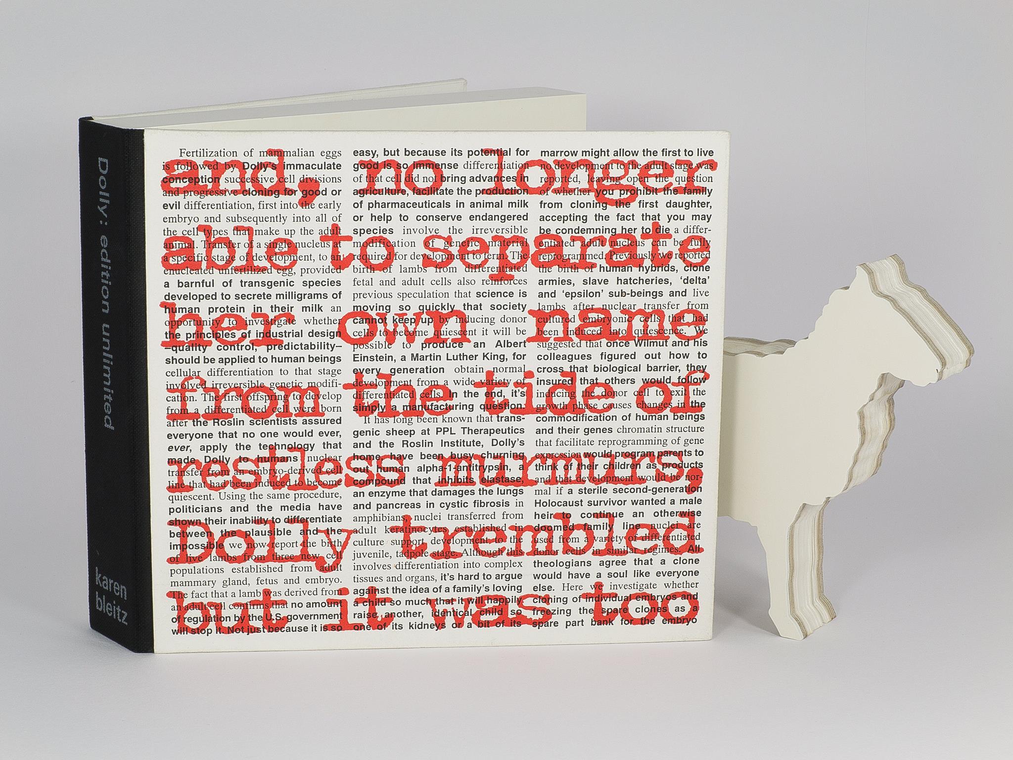 Full view of artist book Dolly: Edition Unlimited by Karen Bleitz, a pop-out jig-sawed book-work on the theme of the cloned sheep, Dolly, with a freestanding herd of sheep integrated into the form of the book.